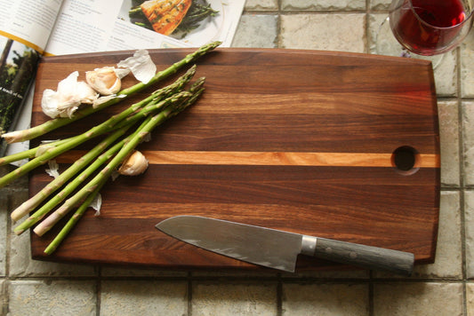 Walnut and Cherry cutting board with curved edges