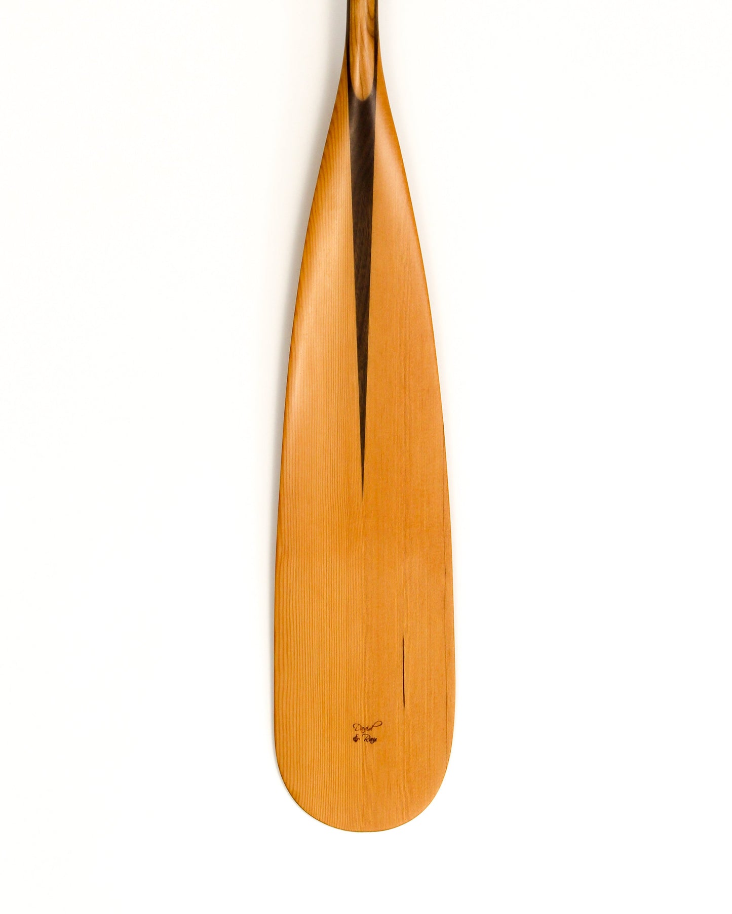 A single wooden paddle blade photographed vertically against a plain white background, showing a warm honey-brown wood tone with a darker center seam and a small engraved logo near the bottom.