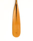 A single wooden paddle blade photographed vertically against a plain white background, showing a warm honey-brown wood tone with a darker center seam and a small engraved logo near the bottom.