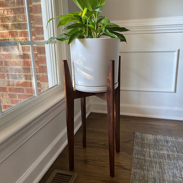 Our MCM inspired indoor plant stand hand made of solid wood our original design